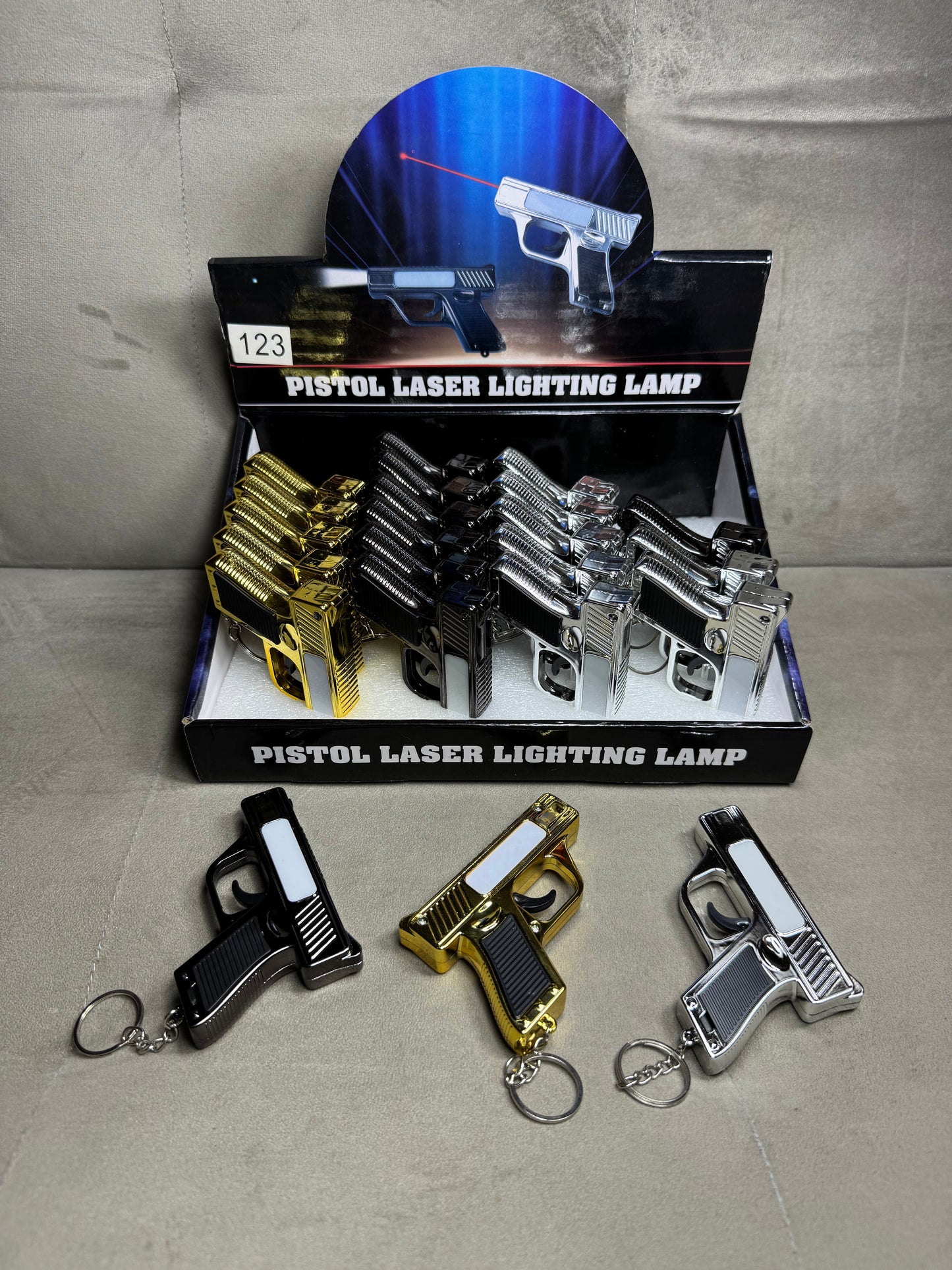 Toy laser, flashlight gun keychain