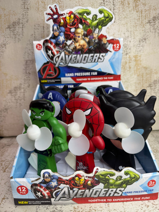 Toy figures in a box with Avengers branding on a textured surface